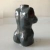 Busto de pecho oprimido